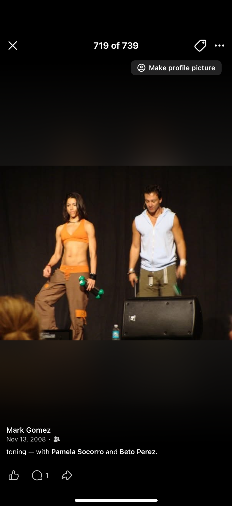 Pamela presenting onstage with Zumba creator Beto Perez